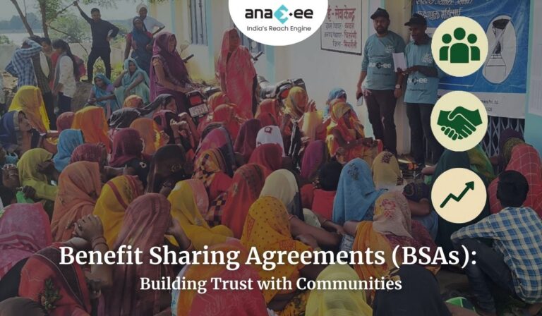 Community gathering in a rural setting with Anaxee facilitators engaging local people, symbolizing benefit sharing agreements that build trust and ensure fair distribution of carbon finance benefits.